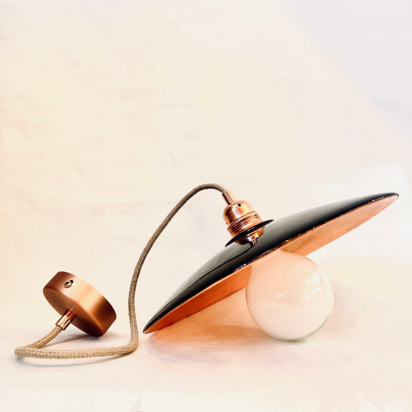 Pendant lamp complete with textile cord, flat ceramic lampshade, and metal finishes Corten effect with bulb