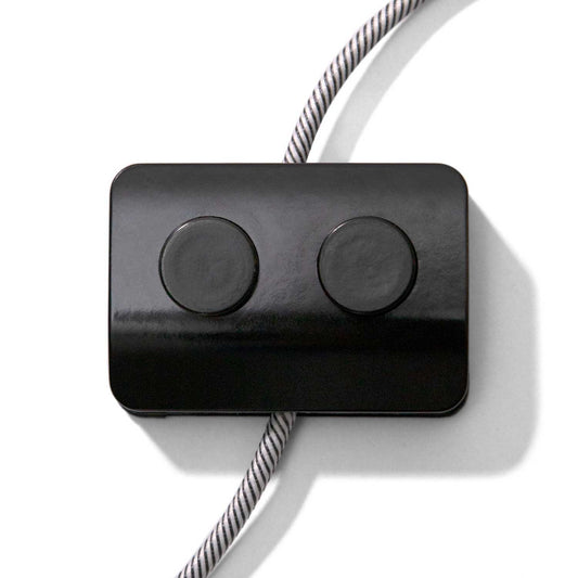 Interruttore Unipolare Nero con doppia accensione a pedale - Design by Achille Castiglioni