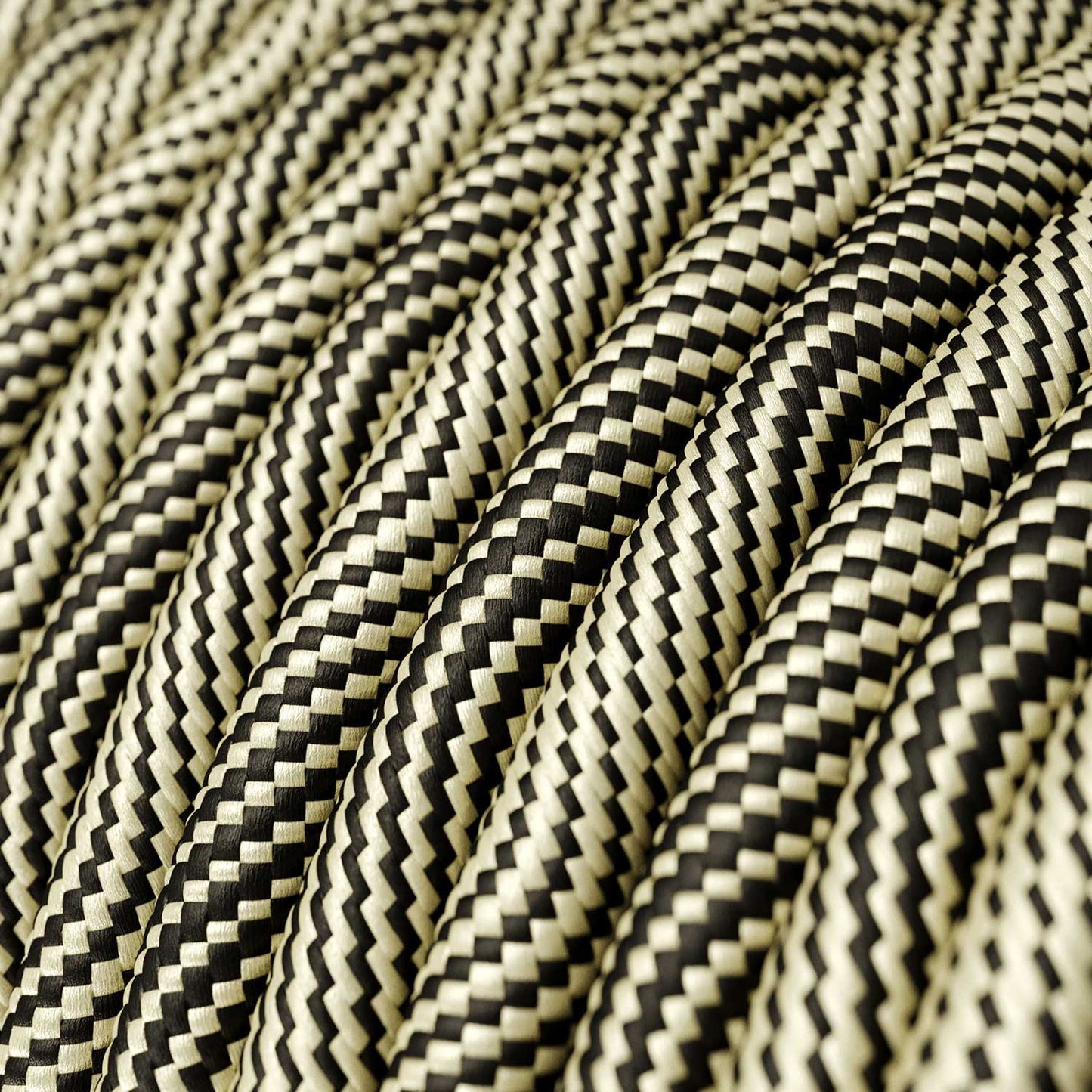Glossy Black and Gold Optical Vertigo Textile Cable - The Original Creative-Cables - ERM65 round 2x0.75mm / 3x0.75mm